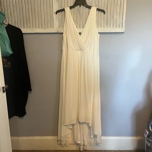 Torrid high low, deep v, polyester occasion dress. Quality. Stretch. Comfort.